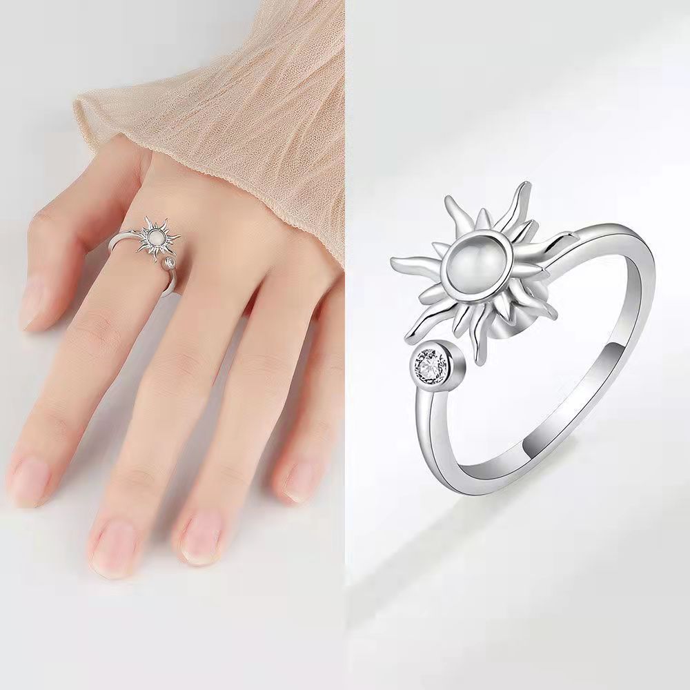 Velora Ring silver sun design star and moon jewelry ring with small clear stone on finger