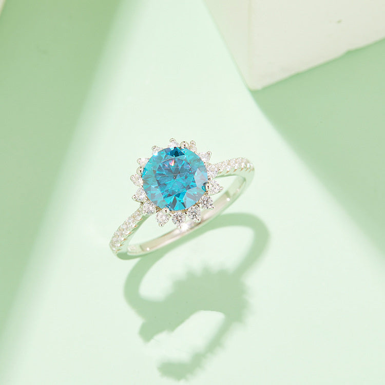 Velora Ring featuring a unique gem ring for women with a blue center stone and surrounding diamonds