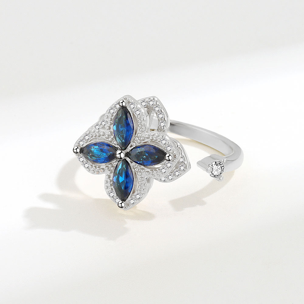 Velora Ring with blue zircon stones shaped like a flower zircon decompression ring for women